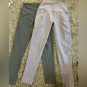 Beyond Yoga leggings' Charcoal gray and purple. 2 pairs for the price of one!